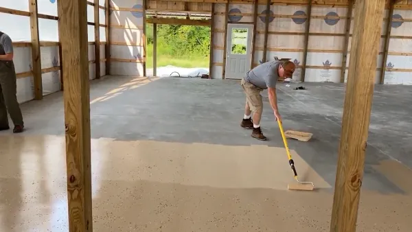 Is it better to roll or spray concrete sealer